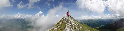 Franciska Demeyer on the tricky ridge of the Casanna, Albula Alps, Switzerland