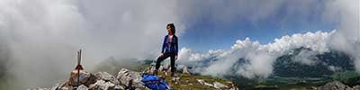 Franciska Demeyer on the tricky summit of the Casanna, Albula Alps, Switzerland