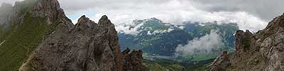 Clouds are clearing on our way to the summit of Casanna, Albula Alps