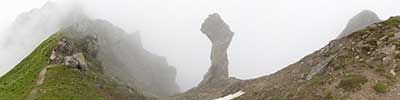 Der Pimmel, a dick shaped rock on the ridge of the Casanna, Albula Alps, Switzerland-