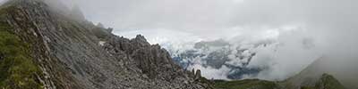 The sky slowly clears after a period of bad wather, Albula Alps, Switzerland